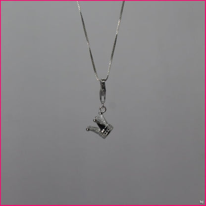 Colgante Corona Elegante: Tu toque de realeza personal 👑✨
