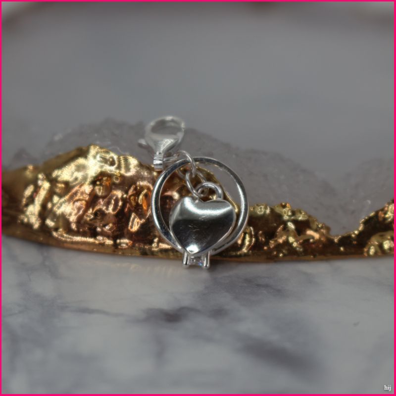 Colgante Corazón con Anillo: Un Símbolo de Amor y Eternidad ❤️